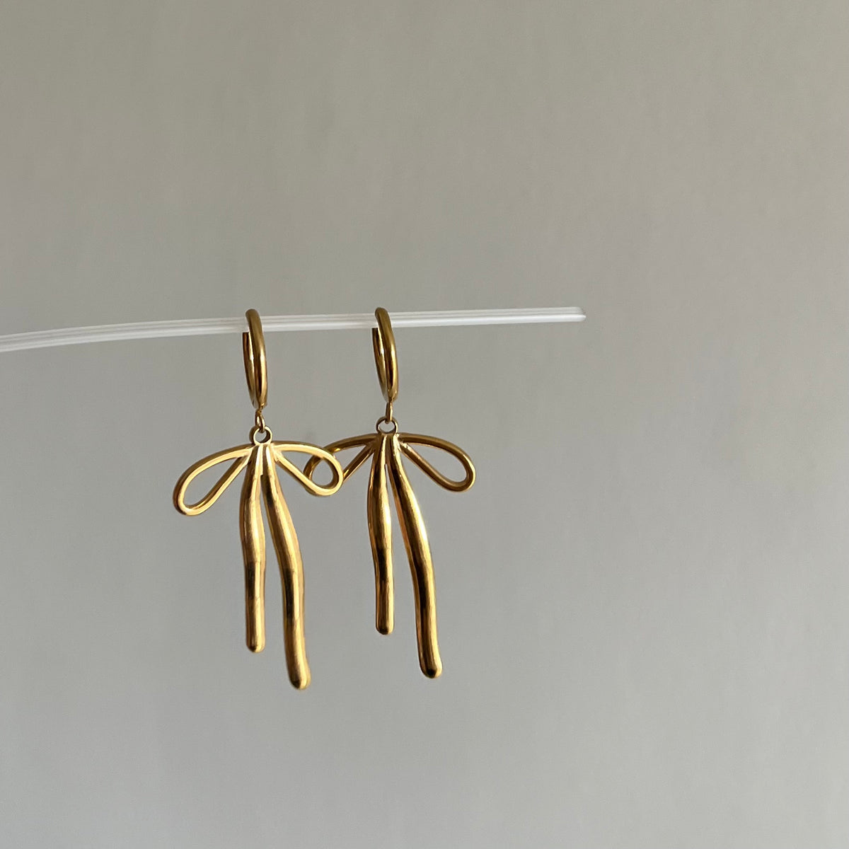 18KT Gold Plated Dropping Bow Earrings