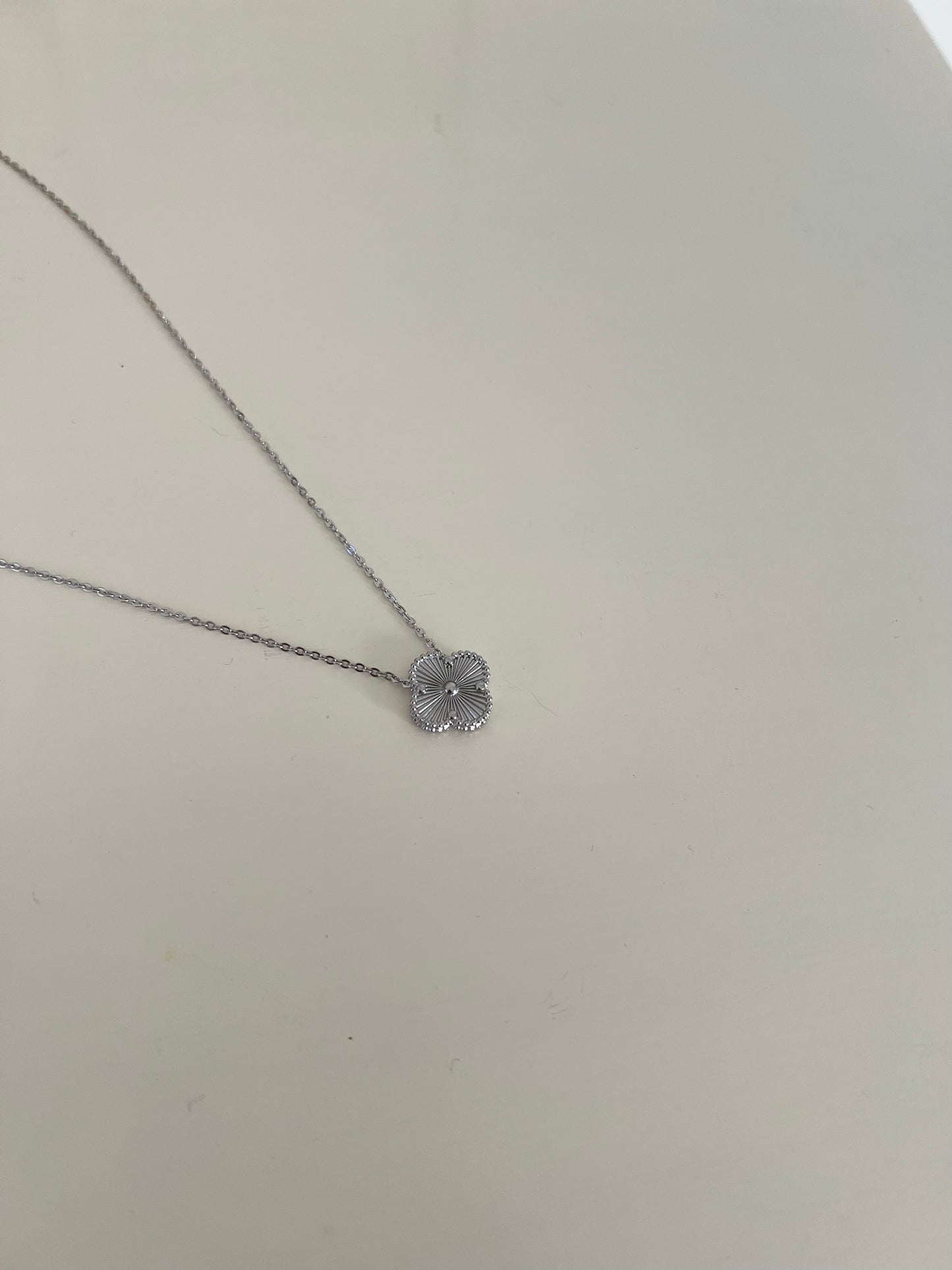 Silver toned Jaggy Clover Necklace