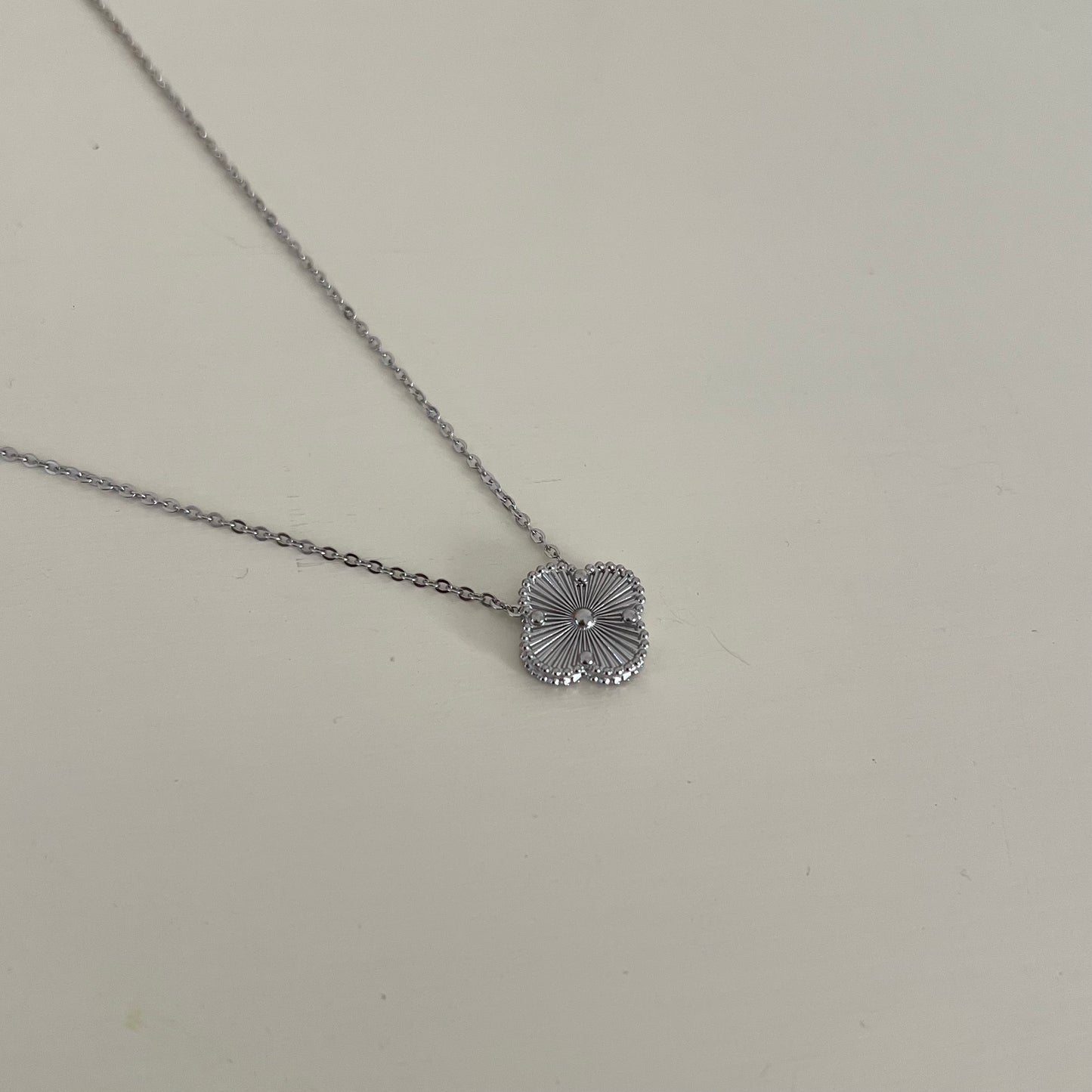 Silver toned Jaggy Clover Necklace